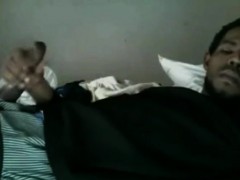 Black Guy Lying On The Bed And Jerks Off His Cock