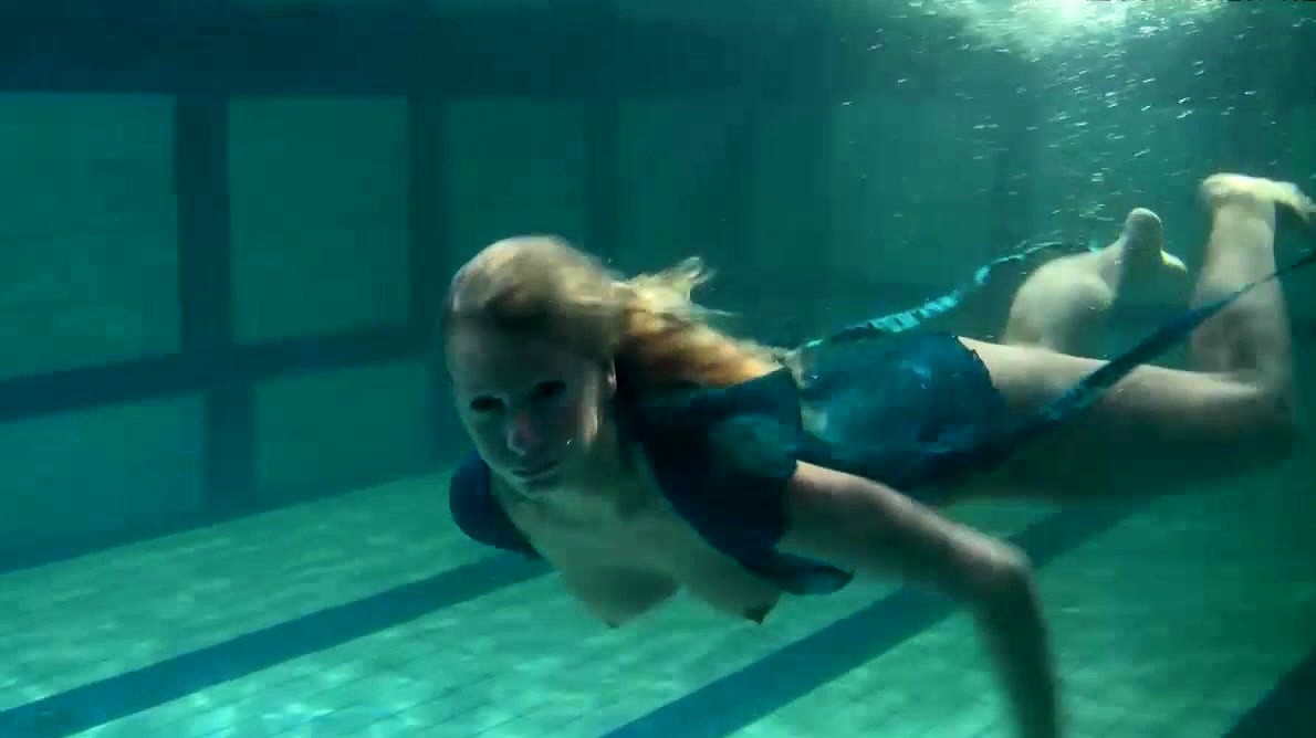 Blonde Feher with big firm tits underwater