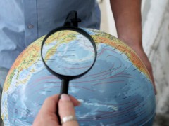 Sofy may need a magnifying glass to explore the globe, but