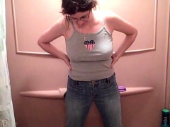 Busty MILF pissing in her pants