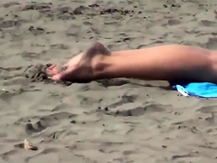 Voyeur girl naked on public beach