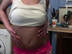 Perfect teen masturbates on the kitchen counter