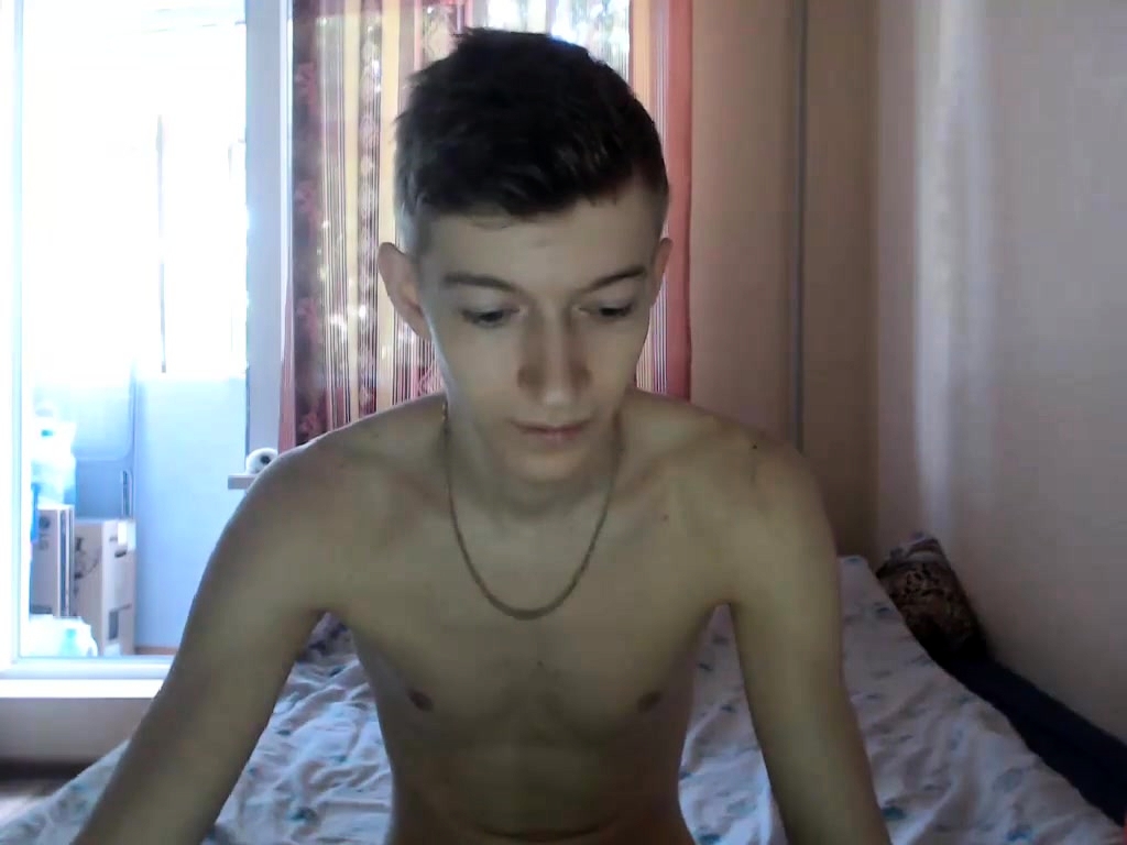 Skinny gay twink enjoys hot solo jerk off on bed