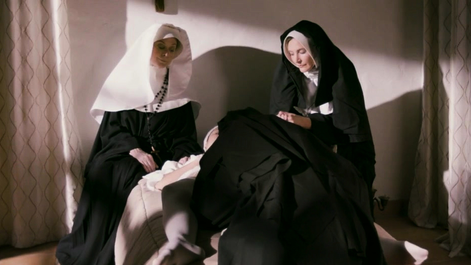 Busty lesbian nun licks