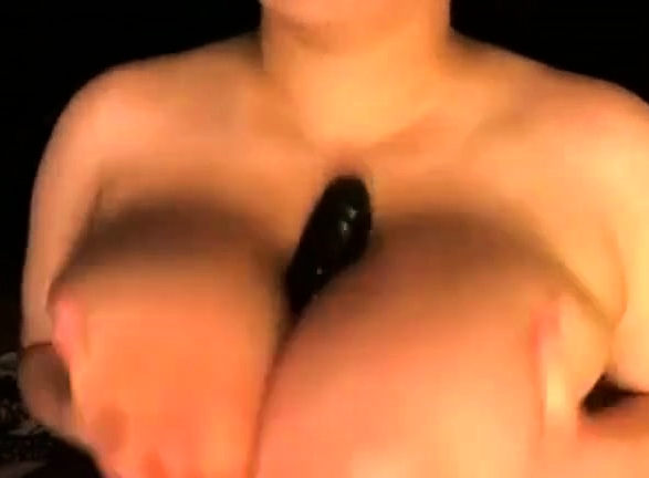 Lisa playing with her huge boobs