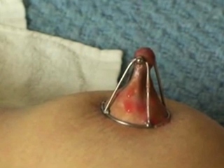 Nipple Clamps And Glowing Wax