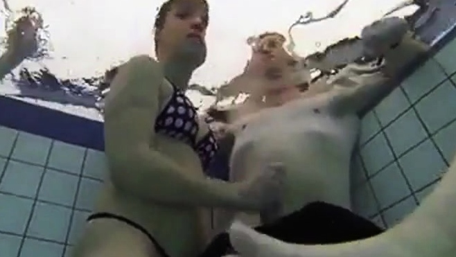 Teen Gives Handjob In Public Pool