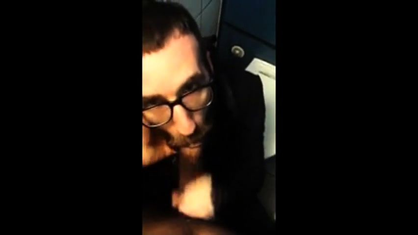 Hot bearded guy sucking guy in public restroom