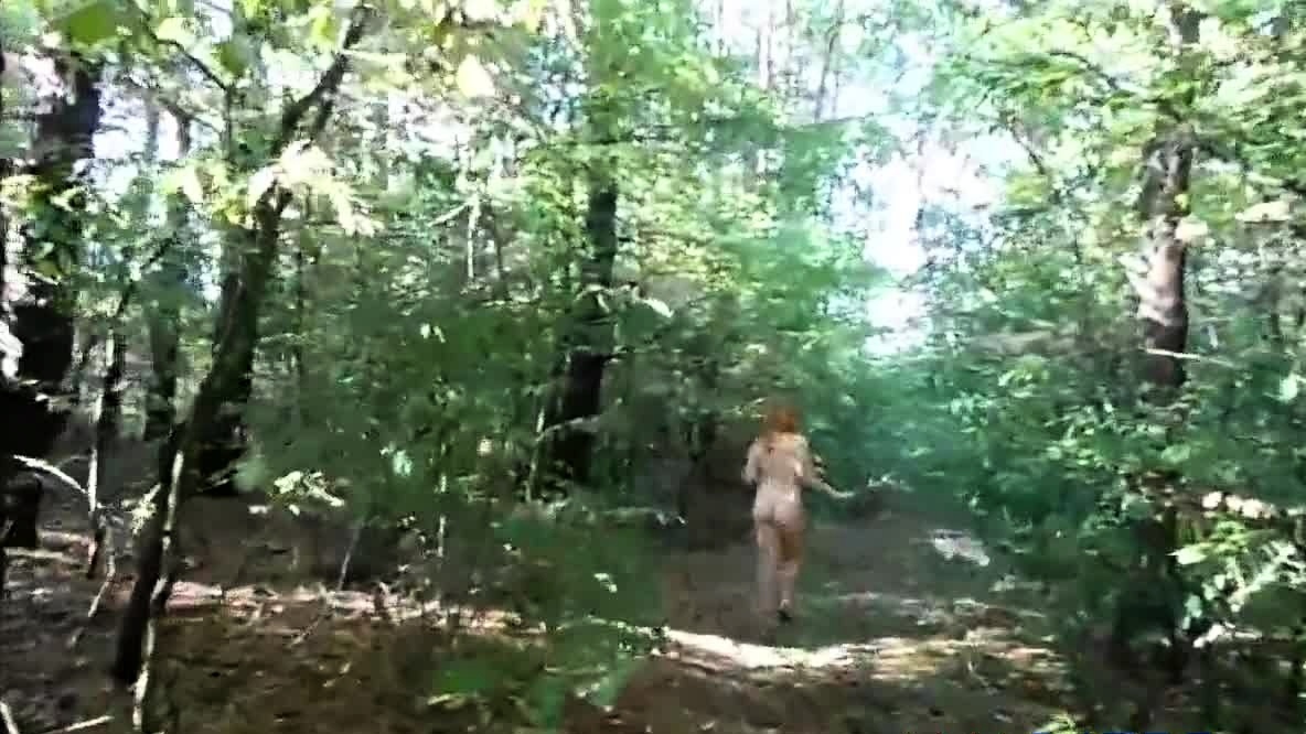 chubby girl with big booty walking nude in forest