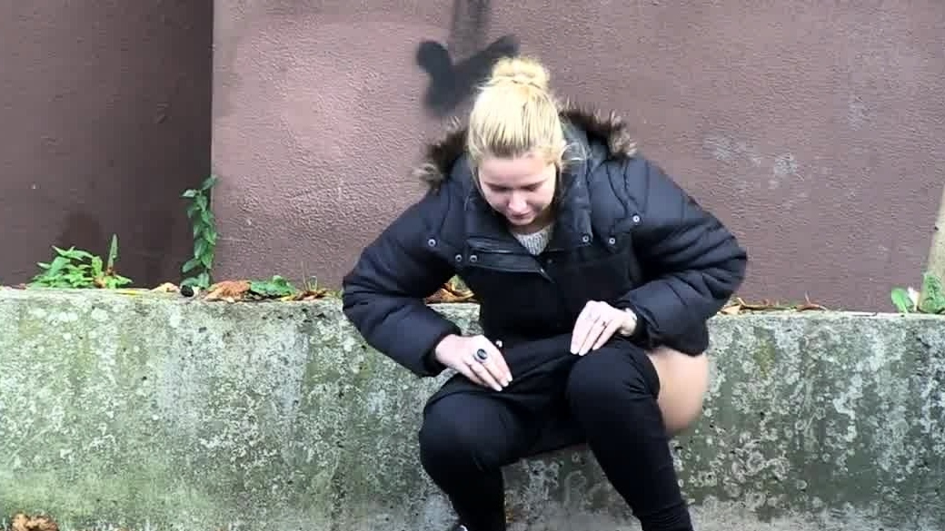 Squatting Between Parked Cars To Piss In Public