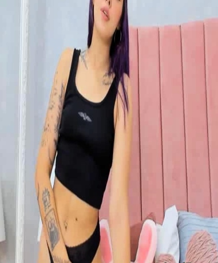 Purple Haired Woman Giving Her Best To Cum