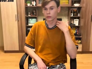 Good looking gay boy jerks off in front of webcam