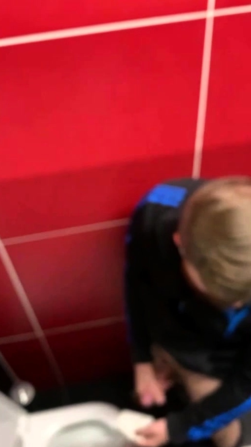 Spying on a blond guy cumming in the toilet