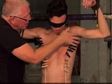 Submissive Jesse Evans endures foot play from Master Xavier