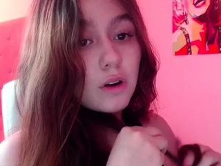 Small titted brunette teen fingering on the bed