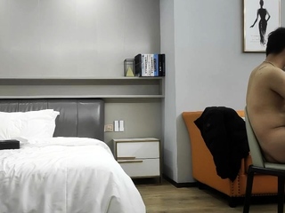 Cute amateur asian web cam girl playing with her toy