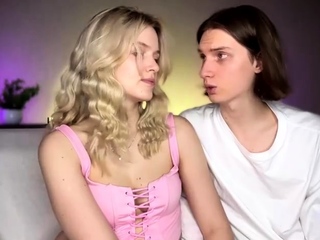 Blonde teen toying her pussy with glass dildo on webcam